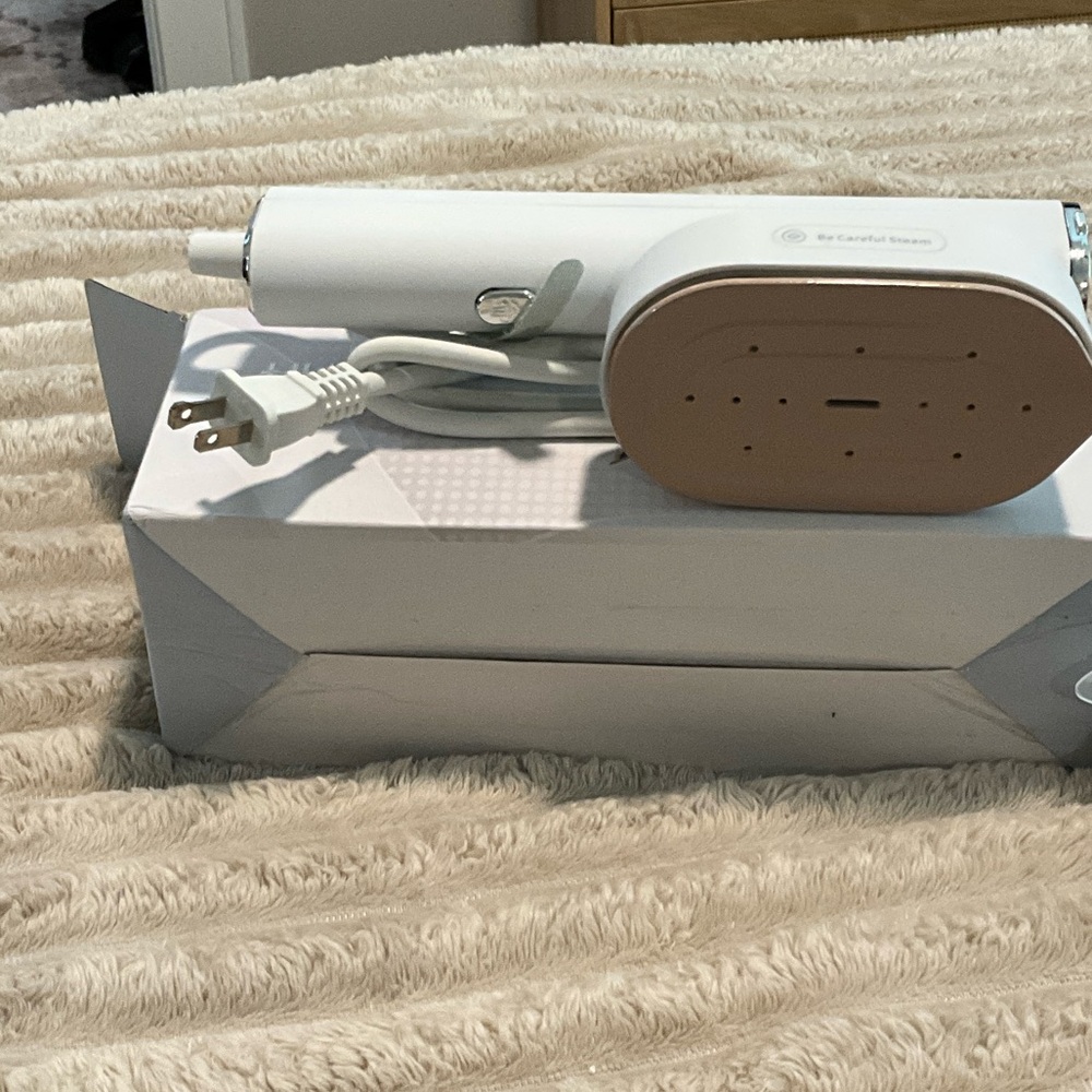 Cordless White and Tan Travel Steamer